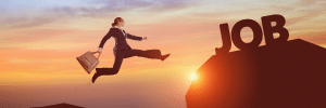 Image of person jumping for a new job in the sunset searching for online job boards